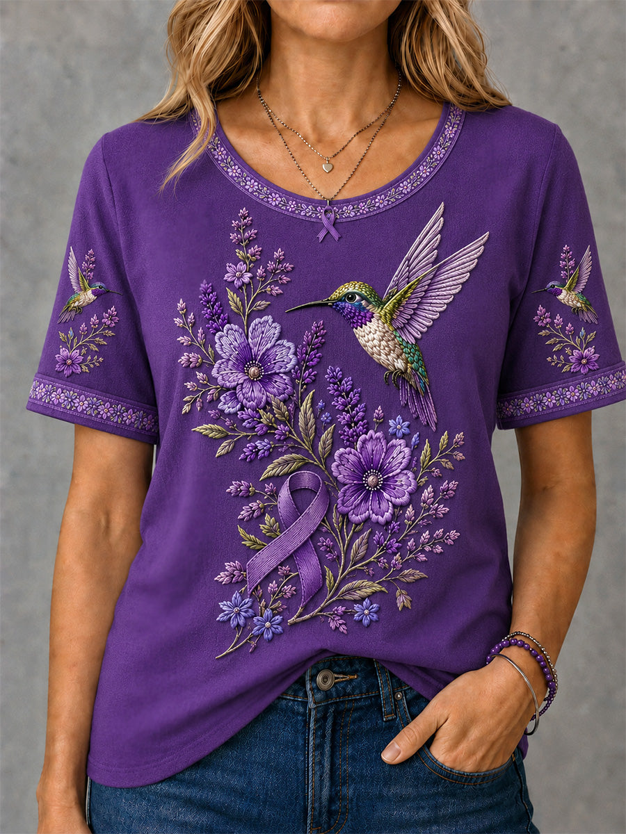 Dame-T-shirt med lilla blomster- og kolibriprint til støtte for alzheimers-ophidselseskampagnen