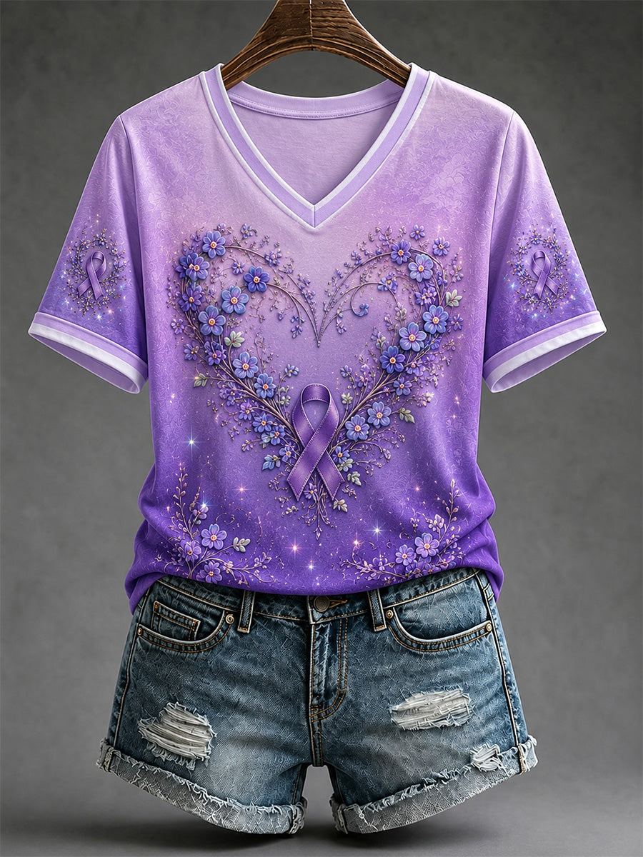 Dame-T-shirt med lilla blomsterprint, til støtte for alzheimers-indsatsen, med V‑udskæring