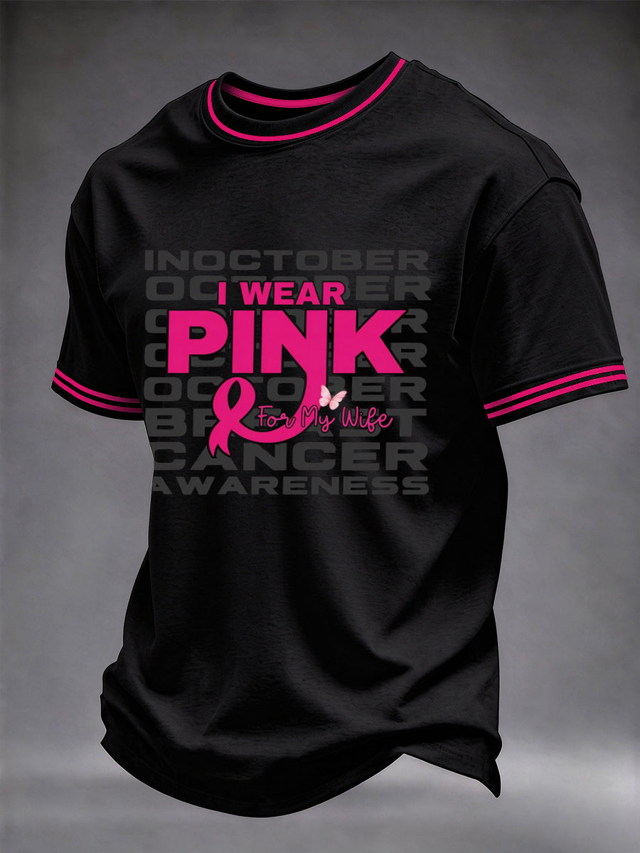 Mænds T-shirt til støtte for brystkræftsbevidsthed: "Rigtige mænd bærer pink"