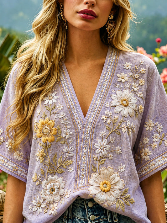 Kvinders retro top i bomuld og hør med blomsterprint og V-udskæring