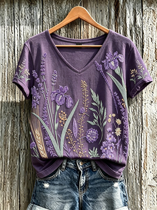 Dame-T-shirt i lilla med plantebloemotiv, trykt og afslappet stil