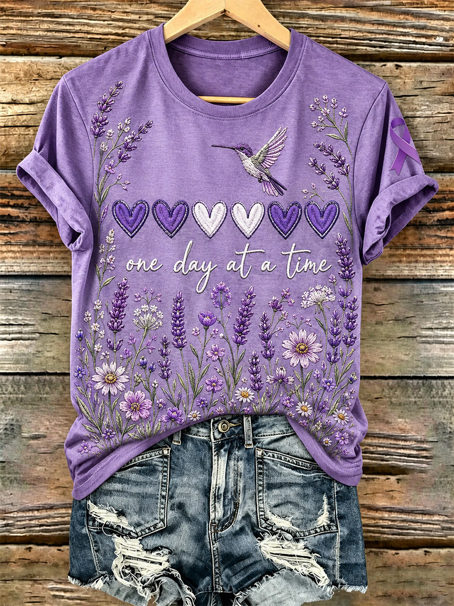 Dame-T-shirt med lilla blomster- og Alzheimers-handskermærke
