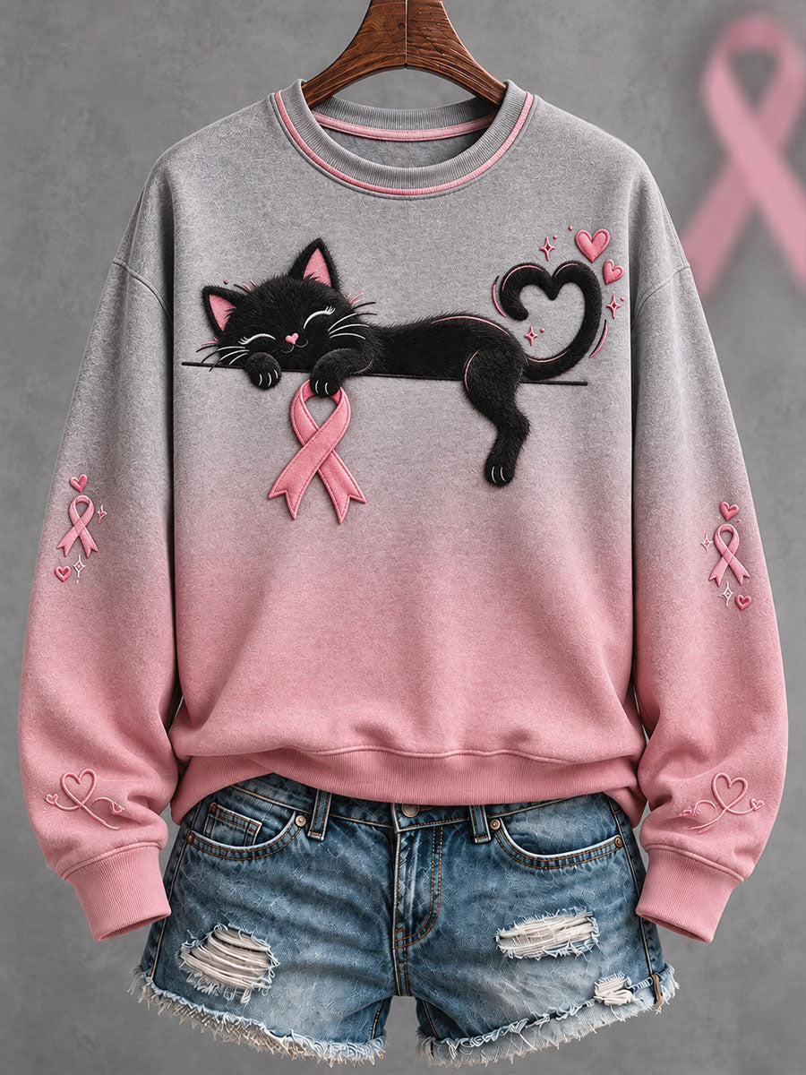 Lyserød sweatshirt med kunsttryk til bevidsthedsoplysning om brystkræft hos kvinder